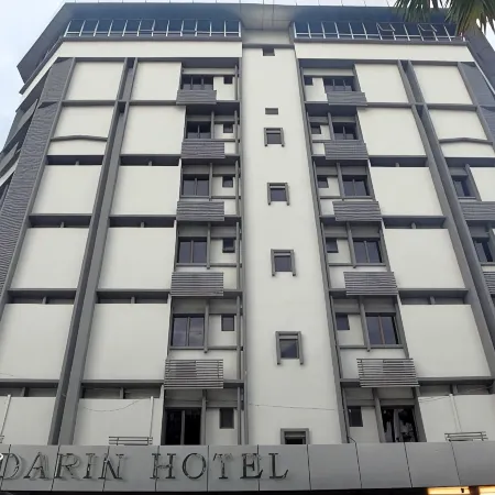 Mandarin Hotel Kota Kinabalu Отели рядом с достопримечательностью «Часовая Башня Аткинсон»