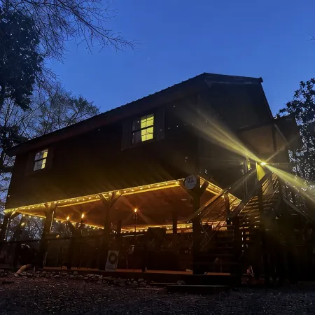 Creek-side getaway, big deck, easy access to the city while being off the grid!