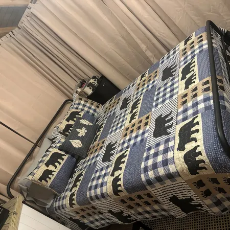 Mentone glamping getaway in a private screened in cabin in charming Mentone