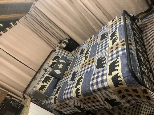 Mentone glamping getaway in a  private screened in cabin in charming Mentone