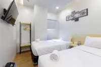 Travel Biz Hotel Medan Mitra RedDoorz Hôtels à : Medan Area