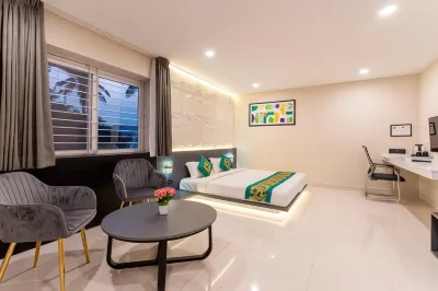 Treebo Sanmaya Retreat Hotels near Karnataka State Open University