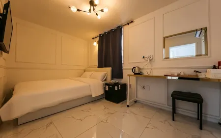 Asan Lawrence Hotel Отели рядом с достопримечательностью «Университет Сонмун»