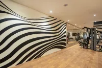 Sunday Hotel & Convention Centre by CheckIn, Vadodara - Phòng tập thể hình