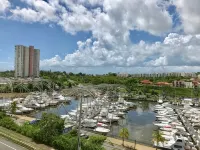 Caribbean Condo with Marina, Pool & Ocean View! 3 Minutes from Seven Seas Beach.