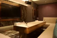 Minghua Hotel (Aksu Tianbai Fashion Shopping Center Xinglong Underground Street Branch) - bar