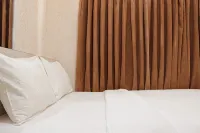 Cozy 2BR Tamansari Panoramic Apartment By Travelio