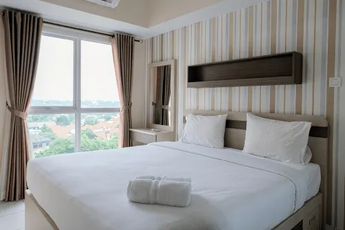 Cozy 1Br at Casa de Parco Apartment by Travelio - Pools
