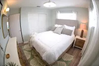 Unique waterfront home, Hot Tub, private boat dock,  walk to beach, pet friendly
