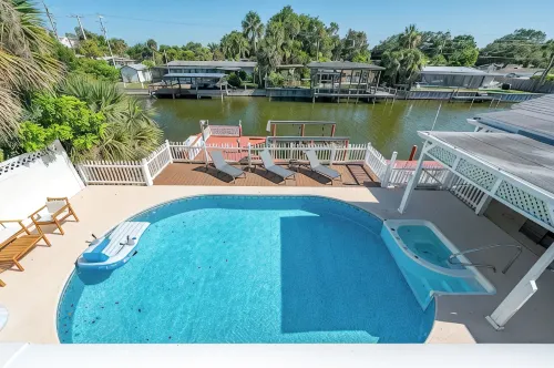 Casa Las Olas - Waterfront Home with Heated Pool, Movie Theater & Arcade