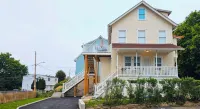 Tranquil Modern Upstairs Apt. Walk to Restaurants & Beach! Off-Street Parking, - Wifi