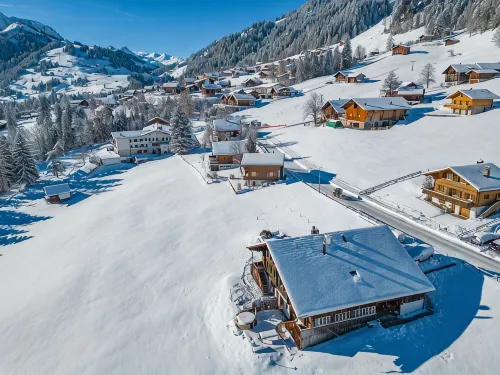 Chalet Rösi | Holiday Apartment with Hot Tub in the Mountains - Wifi