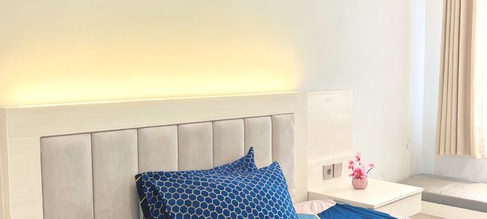 Studio Room with Netflix at Apartemen Grand Kamala Lagoon by Apartemenku Hotels in South Bekasi