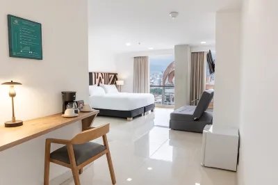 Origen Local Suites Отели рядом с достопримечательностью «Парк Пьес Дескальсос»