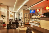 哈羅北站飯店 - 早餐