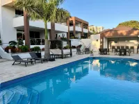 Xanadu Apartments at Blue Bay Golf & Beach Resort - de playa