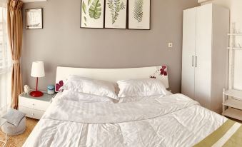 Shi'er Weidi Apartment (Caiwuwei Yijie)