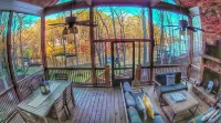 Breathtaking porch just steps from the water.