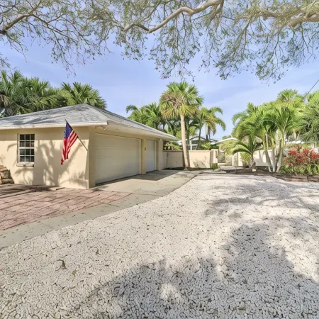 Private Oasis at the Beach with HEATED Pool, Dock and Boat…..Dolphin paradise!