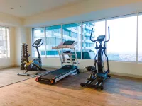 Comfy Design Studio at Grand Kamala Lagoon Apartment by Travelio