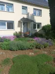Gemütliche Ferienwohnung mit Terrasse und Wunderschönem Garten - Homestays