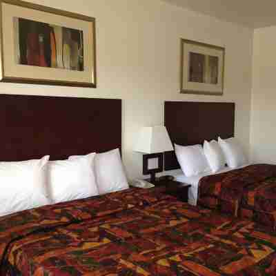 America Inn & Suites Rooms