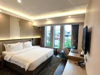 Hotel WAH FU Hoteles cerca de Distrito 8