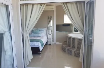 Private Room with a jacuzzi on the Beach!