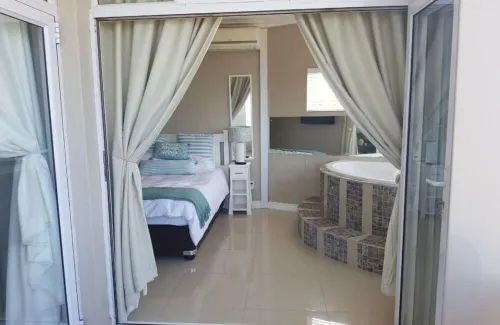 Private Room with a jacuzzi on the Beach!