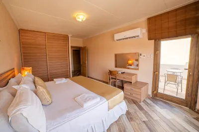 Palm Beach Resort Отели рядом с достопримечательностью «King Fahd University of Petroleum and Minerals»