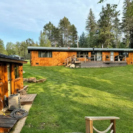 Welcome to Shangri-Lodge Your 2 cabin retreat on a family friendly lake.