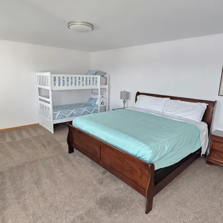 Spacious Lakehouse Getaway. Private Dock with large fenced Backyard and Gameroom