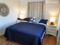 Indoor/outdoor pet-friendly beach house next to world-class beach and river. - Beach