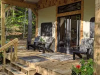 Custom Design Safari Tent Overlooking a Serene Running Creek & Natural Waterfall - Boutique