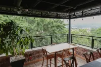 Bunde Haus Hotel Express Boutique Отели в г. Ибагу
