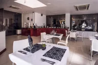 Airport Inn and Suites - Desayuno