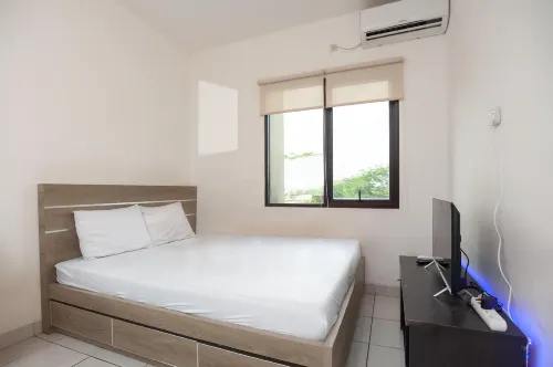 RedLiving Apartemen RQ at Ecohome Citra Raya - 2-Star