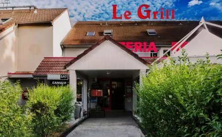Logis Hotel Lons-Le-Saunier - Restaurant le Grill Отели в г. Юра