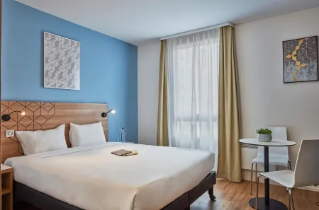 Aparthotel Adagio Access Paris Quai d'Ivry Отели в г. Валь-де-Марн