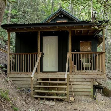 Remote cabin with creek and waterfall views 10 min from town