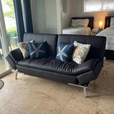 Amazing views from this ground floor, corner unit steps from the beach!