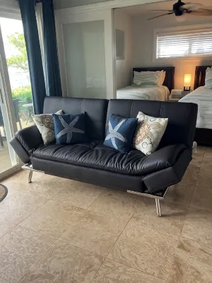 Amazing views from this ground floor, corner unit steps from the beach!