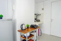 Cozy and Simple 1BR at Apartment Grand Sentraland Karawang By Travelio - Homestays