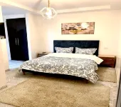 Cozy 1BR Retreat, Steps to Sand Отели в г. 