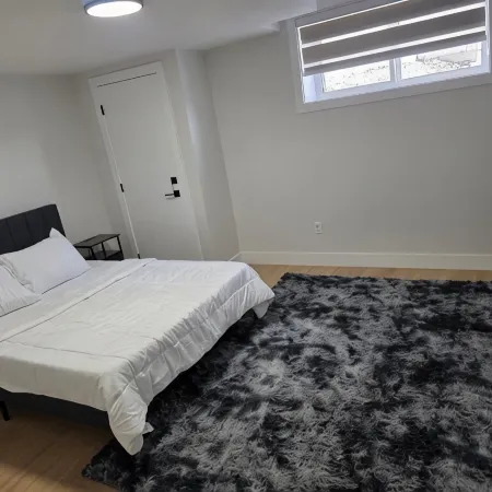 Cozy Irvine Creek Walk-out Suite 10 Mins to YEG