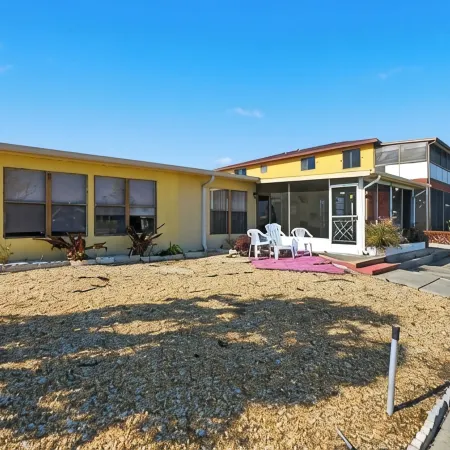 4 bedrooms home located on the deep water canal 13630 Garris Dr. Hudson Fl 34667