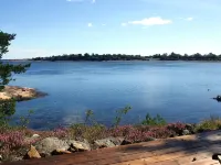 Cozy vacation home in southern Norway (Tromøy, Arendal) with a boat and a pier.