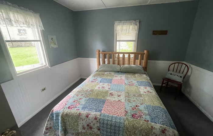 Cottage 1 is a charming 2 bedroom only 25’ from its boat dock & Hamlin lake.