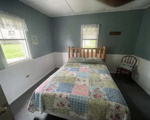 Cottage 1 is a charming 2 bedroom only 25’ from its boat dock & Hamlin lake. Hotel a Hamlin Township