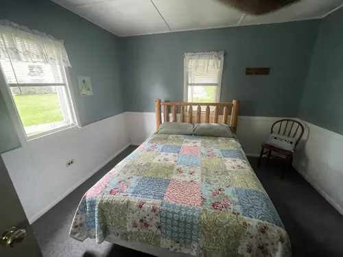 Cottage 1 is a charming 2 bedroom only 25’ from its boat dock & Hamlin lake. - 2-Star